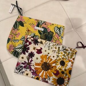 Oscar de la renta fabric clutches